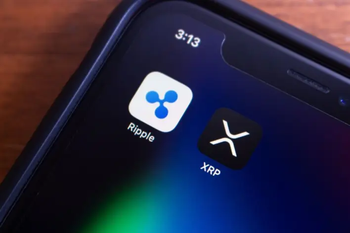 XRP's Wyckoff Setup and 142% Monthly Open Interest Surge Hint at Next Move