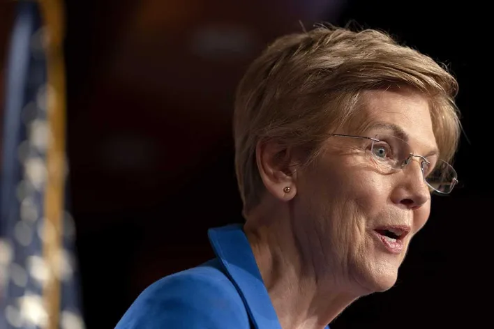 Crypto Clash: Warren Flags Economic Risk, CZ Defends Industry